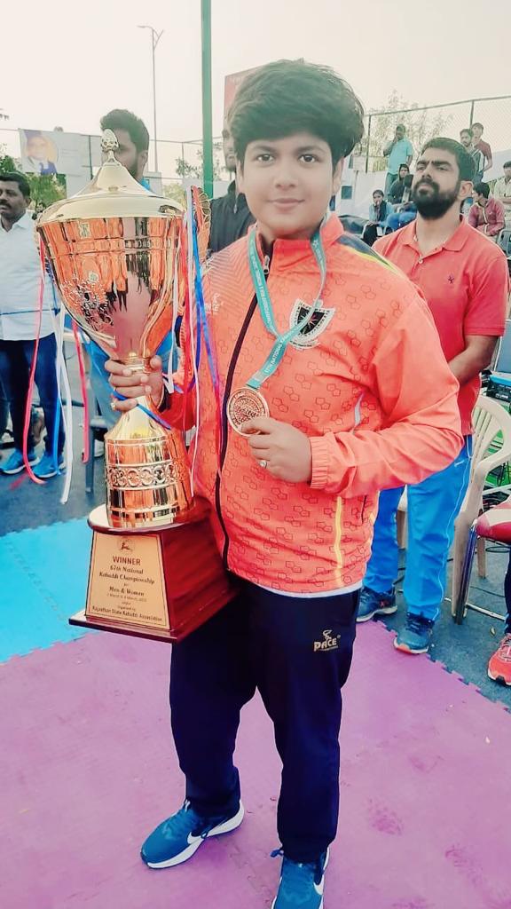 Pinky roy holding the winning trophy from Senior Nation 2020, Jaipur