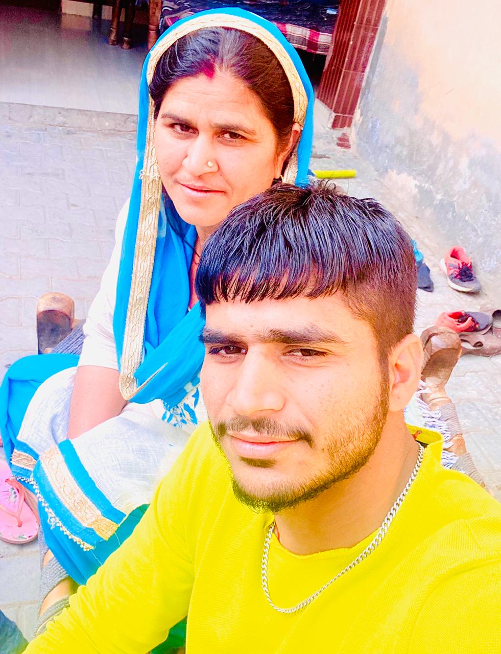 Saurabh Nandal with his mother