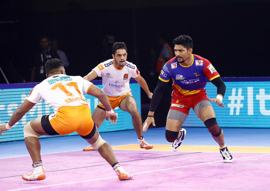 U.P. Yoddha's star raider Rishank Devadiga showcases his raiding skills against Puneir Paltan defense