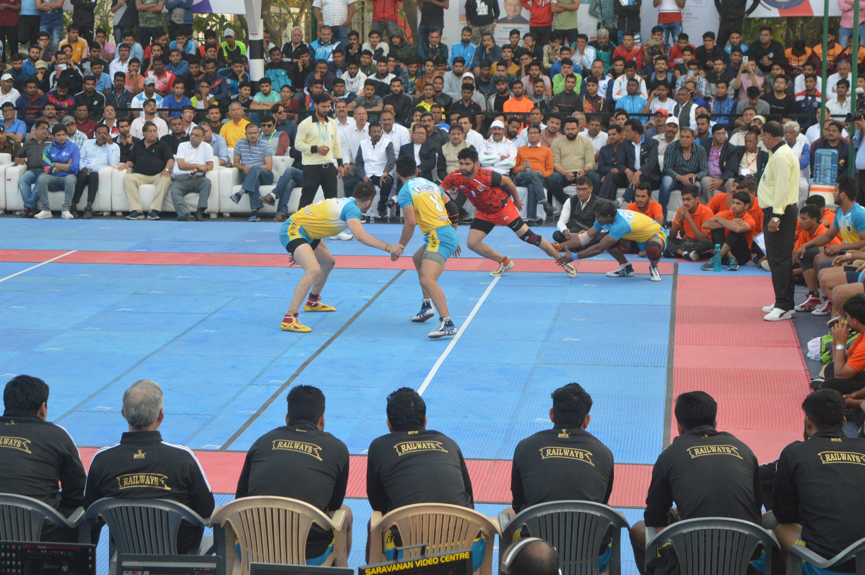 Pardeep Narwal being tackled by Dharmaraj Cheralathan