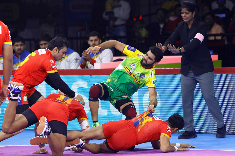 Pardeep Narwal tackled by  the UP Yoddhas defense